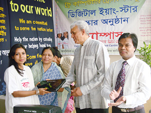 Advisor to Prime Minister Prof. Dr. Gowher Rizvi handed over Computers to the Awardee of Digital Young Star Award as Chief Guest; Dr. M Helal is presiding over. (2010)